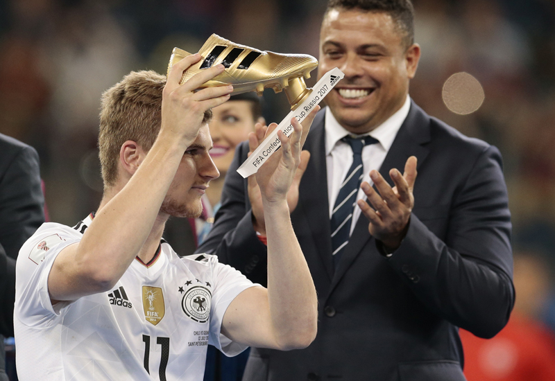 Germany's Timo Werner holds the golden boot trophy, at the end of the Confederations Cup final soccer match between Chile and Germany, at the St.Petersburg Stadium, Russia, Sunday July 2, 2017. (AP Photo/Ivan Sekretarev)