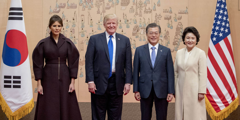 President Donald Trump, center left, and South Korean President Moon Jae-in, center right, pose for photographers with first ladies Melania Trump, left, and Kim Jung-sook at the Blue House in Seoul, South Korea, Tuesday, Nov. 7, 2017. Trump is on a five country trip through Asia traveling to Japan, South Korea, China, Vietnam and the Philippines. (AP Photo/Andrew Harnik)
