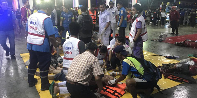 (180706) -- PHUKET, July 6, 2018 (Xinhua) -- Rescued tourists receive medical treatment on the island of Phuket, Thailand, July 5, 2018. Until 8:30 p.m. local time (1330 GMT) Thursday, the majority of 133 passengers on two boats overturned by rough seas in southern Thailand were saved, but the Thai authority cannot confirm all of them are saved now, said Chinese Consulate-General in Songkhla on Thursday.(Xinhua) (srb)